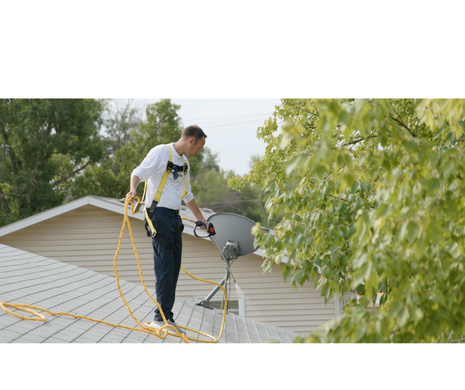 Technician working on a residential asphalt shingle roof in Lane County, Oregon
